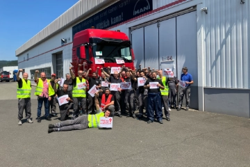 Beschäftigte von MAN Truck & Bus AG - Truck Modification Center beteiligen sich
